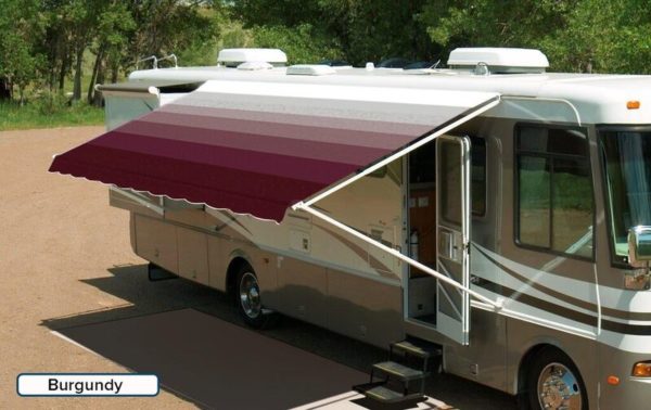 A RV with an extended awning labeled "Burgundy"