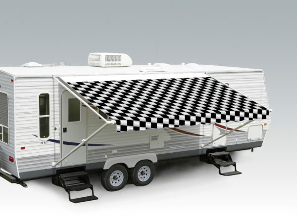 A trailer with an extended awning labeled "Checkered Flag"
